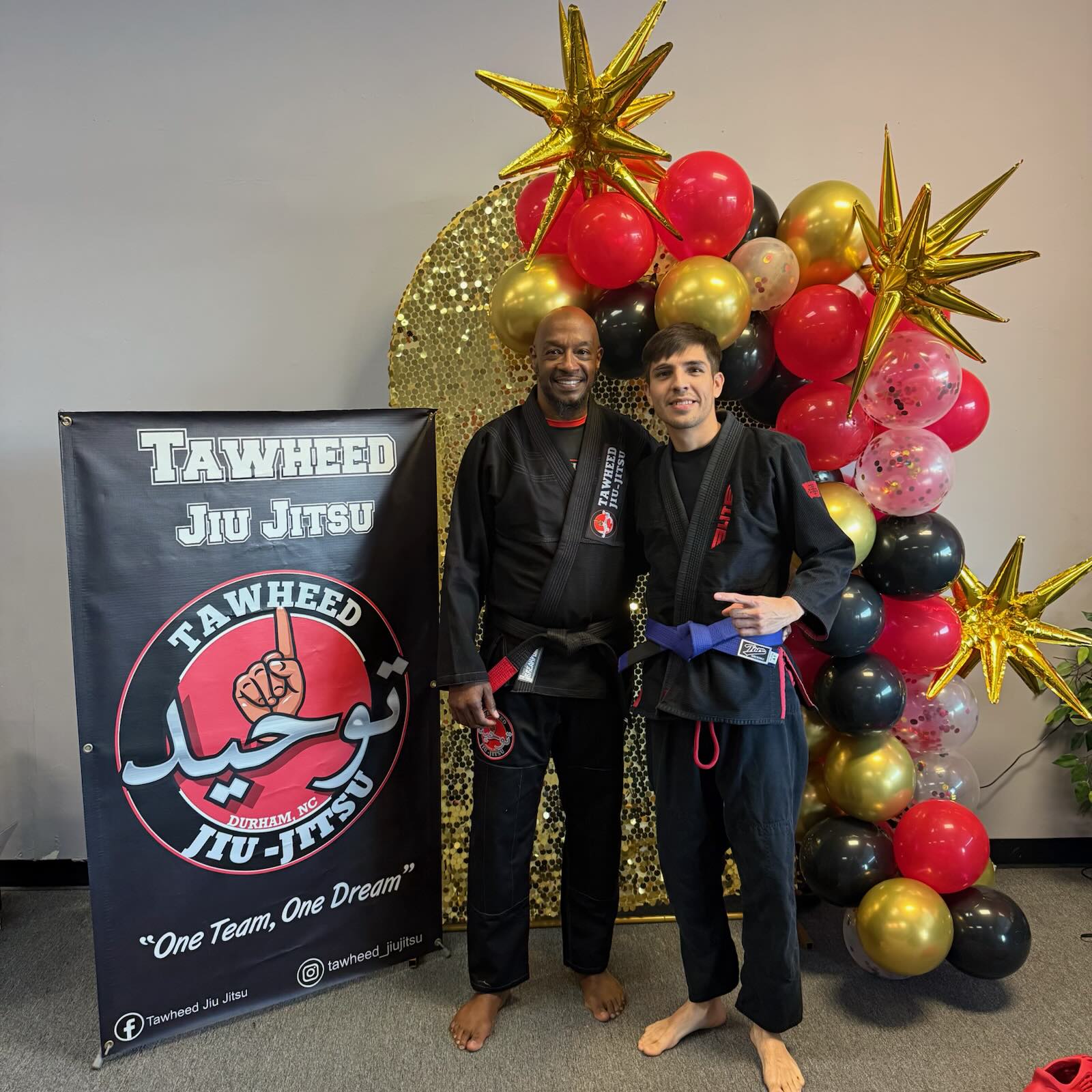 Coach with blue belt student